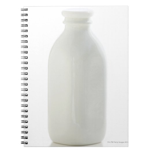 Melkfles op witte achtergrond notitieboek (Voorkant)