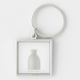 Melkfles op witte achtergrond sleutelhanger