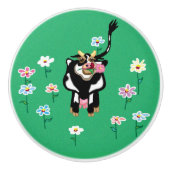 Melkhoudende koe in een bloementveld keramische knop (Voorkant)