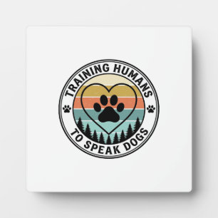 Menschen trainen om honden te spreken Vintage Paw Fotoplaat