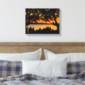 Mensen aan de rand van de rivier bij zonsondergang canvas afdruk (Insitu (Slaapkamer))
