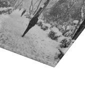 Mensen in het park op sneeuwwinterdag snijplank (Hoek)
