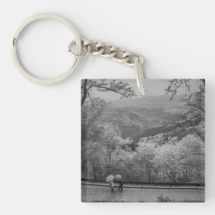 Mensen met paraplu's sleutelhanger