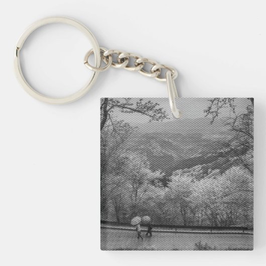 Mensen met paraplu's sleutelhanger (voorkant)