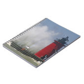 Mensen op een steegje zien grote golven in 2 notitieboek (Linkerzijde)