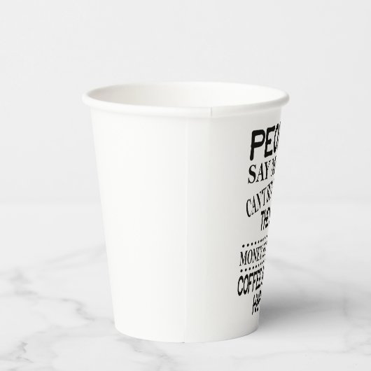 Mensen zeggen dat geld geen geluk kan kopen papieren bekers (Rechts)