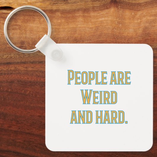 Mensen zijn raar en hard sleutelhanger (Voorkant)