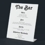 Menu Chic Retro Vintage Wedding Drinken Bar Reclamebord Met Voetstuk<br><div class="desc">De bar is open. Het Chic Wedding Bar Menu Sign. met retro geïnspireerde typografie en een aanraking van vintage - een trendy zwarte en witte drinken menu voor uw bruiloft of een andere viering. Eenvoudig gezet in uw eigen menu van drinken - alle kleuren (achtergrond en tekstkleur) kunnen ook worden...</div>