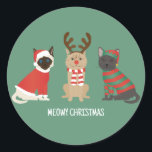 Meowy kerstkatten ronde sticker<br><div class="desc">Illustratie van veel verschillende katten. Ze zijn gekleed in vakantiekleding. Deze kattenkop wordt gebruikt om de vorm van een kerstboom voor het vakantieseizoen te creëer.</div>