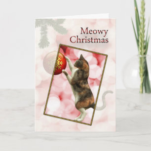 Meowy Kerstmis met een speelse kat. Feestdagen Kaart