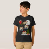 Meranian hond Kerstman slee vliegend grappig magis T-shirt (Voorkant volledig)