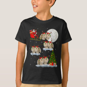 Meranian hond Kerstman slee vliegend grappig magis T-shirt