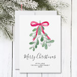 Merry Christmas Mistletoe Feestdagenkaart<br><div class="desc">This holiday card is decorated with watercolor green mistletoe,  a red ribbon,  and stylish script typography that says "Merry Christmas"
Easily customizable.
Original Watercolour © Michele Davies.</div>