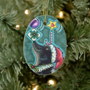MERRY CHRISTMAS SEAL BALANCING GIFTS & CANDY CANE KERAMISCH ORNAMENT