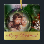 Merry Christmas Unique Fun Bauble Photo Lijst Keramisch Ornament<br><div class="desc">Dit leuke vakantie ornament beschikt over een leuk ornament binnen een ornament design. Het beschikt over een afbeelding van een glazen bol of bauble afbeelding lijst waar u uw eigen foto kunt uploaden. Het onderschrift luidt: "Vrolijk kerstfeest!" De achterkant heeft ruimte voor een korte begroeting of boodschap, evenals jouw naam...</div>