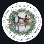 Merry Christmas Wreath Red Berries Name Photo Ronde Sticker<br><div class="desc">Merry Christmas Wreath Red Berries Name Photo Classic Round Sticker These cute little stickers have Merry Christmas written in a pretty script font. These stickers can be customized by changing the family name and foto. Check out the other coordinating products in the collection . For any further customization feel free...</div>