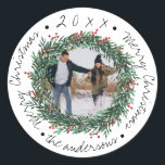 Merry Christmas Wreath Red Berries Name Photo Ronde Sticker<br><div class="desc">Merry Christmas Wreath Red Berries Name Photo Classic Round Sticker These cute little stickers have Merry Christmas written in a pretty script font. These stickers can be customized by changing the family name and foto. Check out the other coordinating products in the collection . For any further customization feel free...</div>