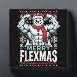 Merry Flexmas - Snowman Flexing Christmas Gym Fotoplaat<br><div class="desc">Omarm de feestelijke geest en sportschool met dit hilarische "Merry Flexmas" -ontwerp! Met een gescheurde sneeuwman met uitpuilende biceps, omringd door feestelijke elementen zoals sneeuwvlokken, kerstbomen en vakantiepatronen, is dit ontwerp perfect voor iedereen die weigert zijn training over te slaan, zelfs tijdens de feestdagen. Of je nu een fitnessliefhebber, bodybuilder...</div>
