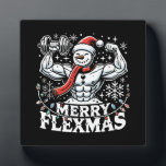 Merry Flexmas - Snowman Flexing Christmas Gym Fotoplaat<br><div class="desc">Omarm de feestelijke geest en sportschool met dit hilarische "Merry Flexmas" -ontwerp! Met een gescheurde sneeuwman met uitpuilende biceps, omringd door feestelijke elementen zoals sneeuwvlokken, kerstbomen en vakantiepatronen, is dit ontwerp perfect voor iedereen die weigert zijn training over te slaan, zelfs tijdens de feestdagen. Of je nu een fitnessliefhebber, bodybuilder...</div>