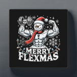 Merry Flexmas - Snowman Flexing Christmas Gym Fotoplaat<br><div class="desc">Omarm de feestelijke geest en sportschool met dit hilarische "Merry Flexmas" -ontwerp! Met een gescheurde sneeuwman met uitpuilende biceps, omringd door feestelijke elementen zoals sneeuwvlokken, kerstbomen en vakantiepatronen, is dit ontwerp perfect voor iedereen die weigert zijn training over te slaan, zelfs tijdens de feestdagen. Of je nu een fitnessliefhebber, bodybuilder...</div>