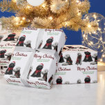 Merry Kersthonden Cadeaupapier<br><div class="desc">Dit Merry Christmas Dogs-ontwerp is voorzien van een schattig trio honden die klaar zijn om feestvreugde te verspreiden! In het midden is een donzige zwarte Puli met een feestelijk pet, met een witte Bedlington Terrier en een felwitte Poedel aan elke kant, allemaal verpakt in gezellige kerstsjaals. Samen brengen deze vakantieliefde...</div>