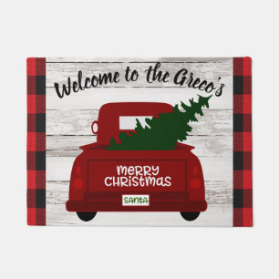 Merry Kerstmis Truck voegt naam Deurmat toe