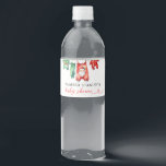 Merry Little Floral Christmas Santa Baby shower Waterfles Etiket<br><div class="desc">Verhoog uw vakantie baby shower met onze Merry Little Floral Christmas Santa Baby shower Water Bottle Label. Met een feestelijke kerstman omringd door levendige rode poinsettia's en wintergroen, voegt dit label een vrolijke touch toe aan uw drankstation. Perfect voor het verpakken van waterflessen van standaardformaat, het decoreert niet alleen, maar...</div>