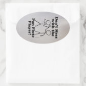 Mess niet met de Pan Flute Player oval Sticker (Tas)