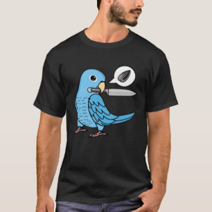 Messenpapegaai wil zaden in blauwe papegaai t-shirt