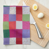 met de hand gebreide kleurrijke patchwerkvierkantj theedoek (Quarter Fold)