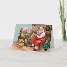 Met de hand getekende Kerstman aan het werk Kaart