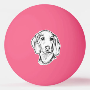 met de hand getekende schets zwarte witte puppy pingpongbal