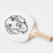 met de hand getekende schets zwarte witte puppy tafeltennisbatje (Zijkant)