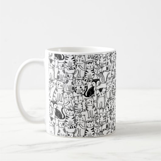 Met de hand getrokken kattenontwerp, zwart-wit koffiemok (Links)