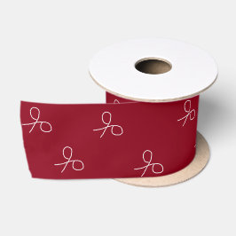 Met de hand getrokken schaar op maroon red satijnen lint