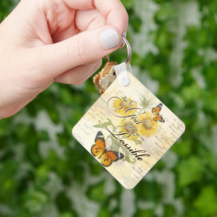 Met God zonnebloemen en vlinder Sleutelhanger