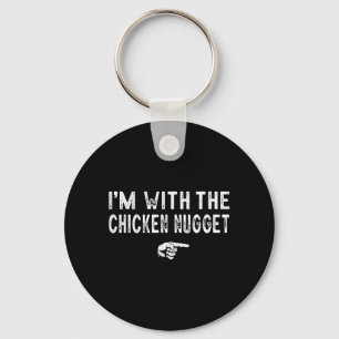 Met het bijpassende luie kipnuggetkostuum sleutelhanger