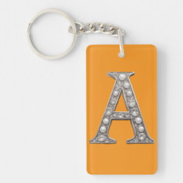 Met juwelen bezette letter A op gele achtergrond Sleutelhanger