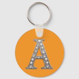 Met juwelen bezette letter A op gele achtergrond Sleutelhanger