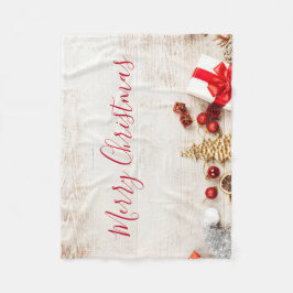 Met kerstmis behandelde items op een Rustige Woode Fleece Deken