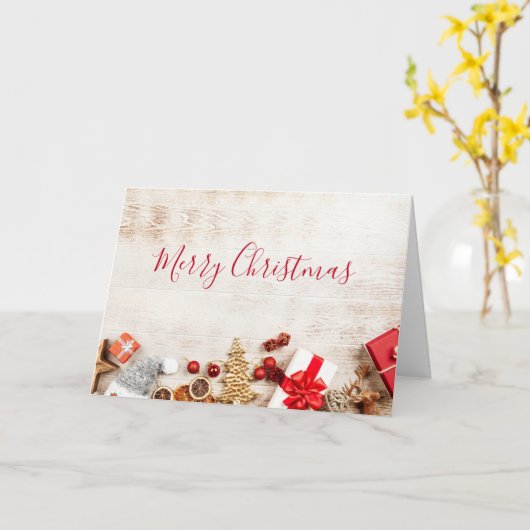 Met kerstmis behandelde items op een Rustige Woode Kaart (Gele Bloem)