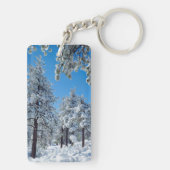 Met sneeuw bedekte bomen in het Laguna-gebergte Sleutelhanger (achterkant)