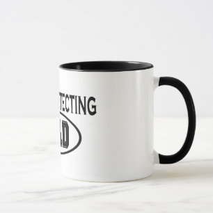 Metaal detecteert pap T-shirts en cadeautjes. Mok