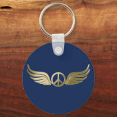 Metaal uitziende vredessymbool met vleugels sleutelhanger (Voorkant)