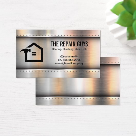 Metaalachtige achtergrond voor huisreparatie met k visitekaartje (Bureau)