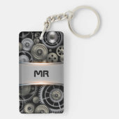 Metaalgrijze onderdruk van metculine sleutelhanger (achterkant)