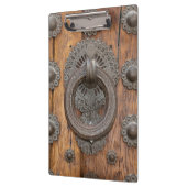 Metaalknop op oude houten deur klembord (Links)