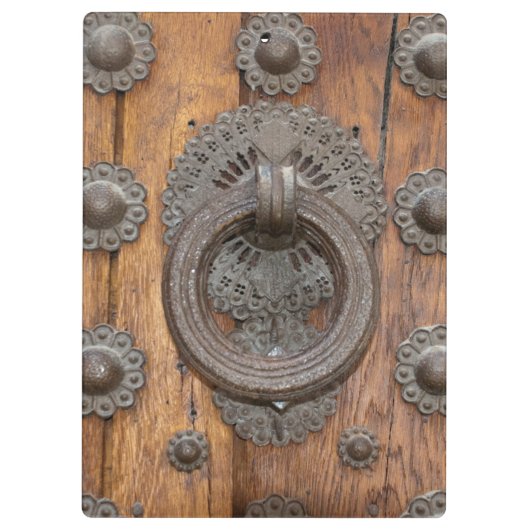 Metaalknop op oude houten deur klembord (Achterkant)