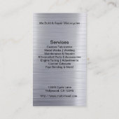 Metaalschedel en moersleutel op geborsteld alumini visitekaartje (Achterkant)