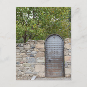 Metalen deur en wand briefkaart